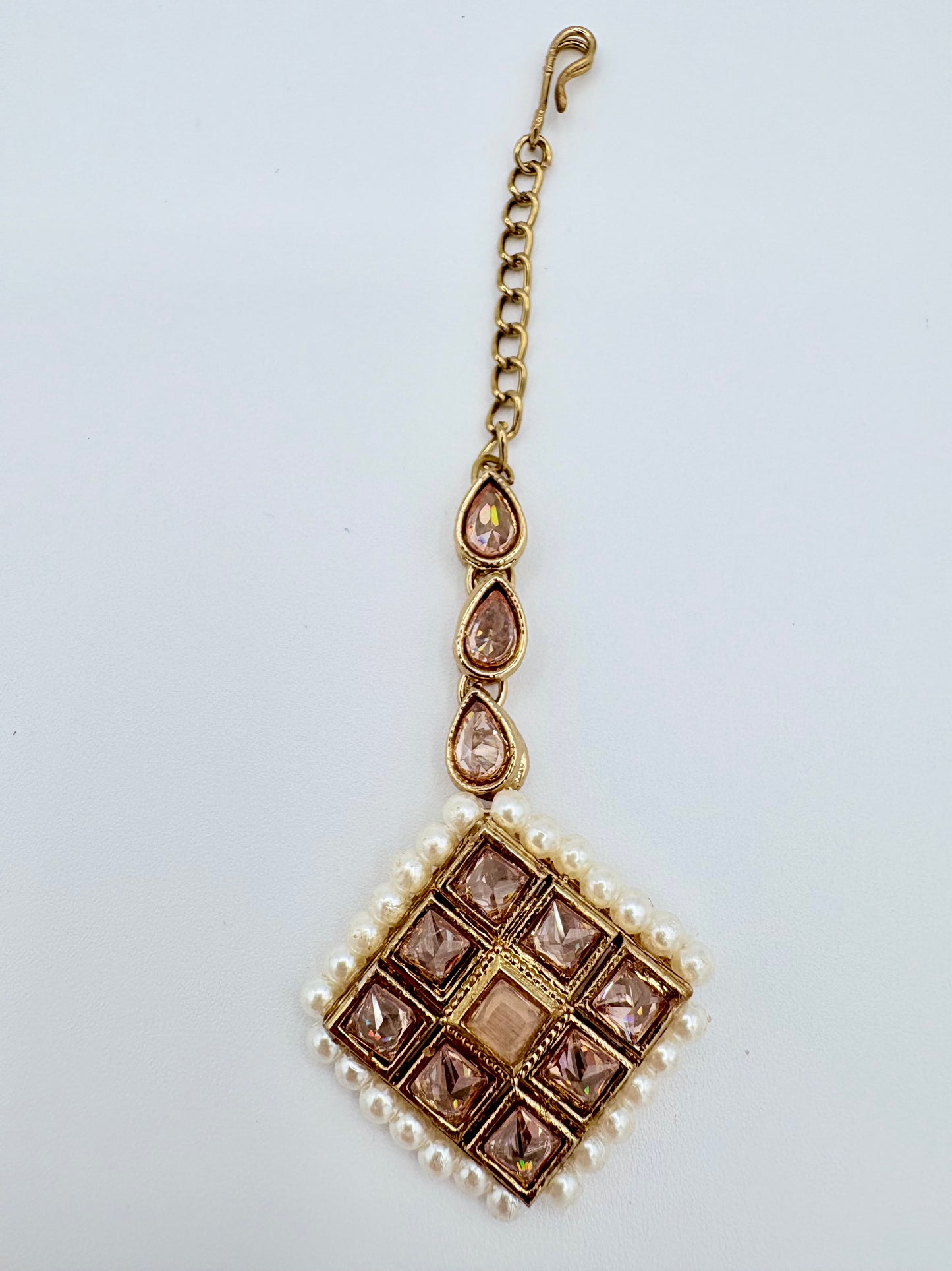 Tikka with gold chain, gemstones, and pearls available at Nishaani.ca – Indian jewelry in Canada