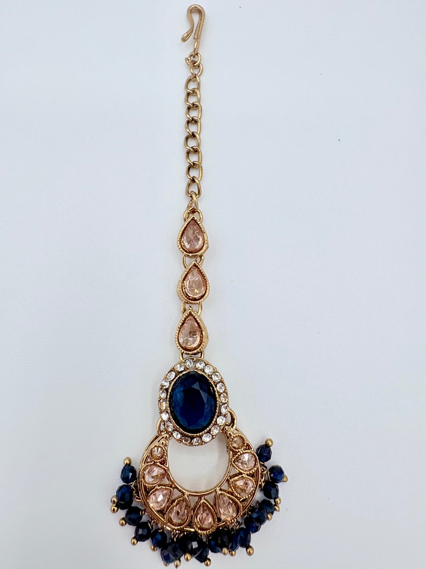 Tikka with blue and gold elements available at Nishaani.ca – Indian jewelry in Canada
