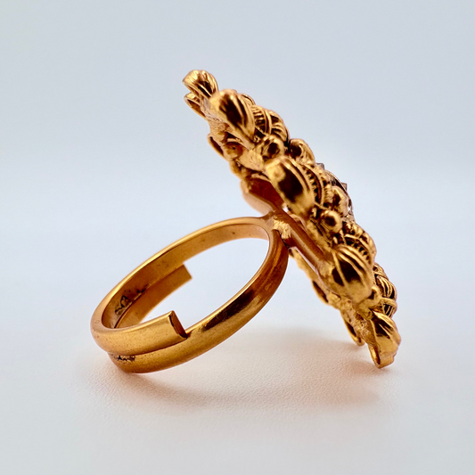 Gold ring with intricate design available at Nishaani.ca – Indian jewelry in Canada