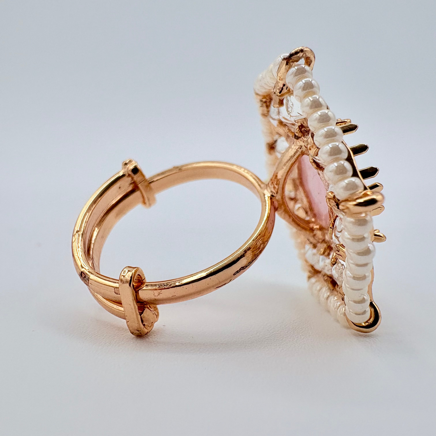 Gold hoop earring with pink gemstone and pearl accents available at Nishaani.ca – Indian jewelry Canada