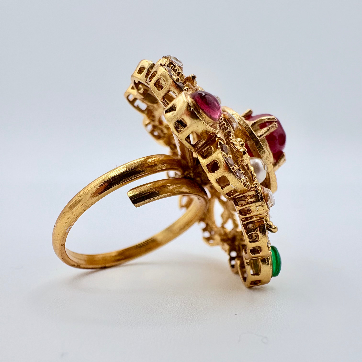 Gold ring with gemstones available at Nishaani.ca – Indian jewelry in Canada