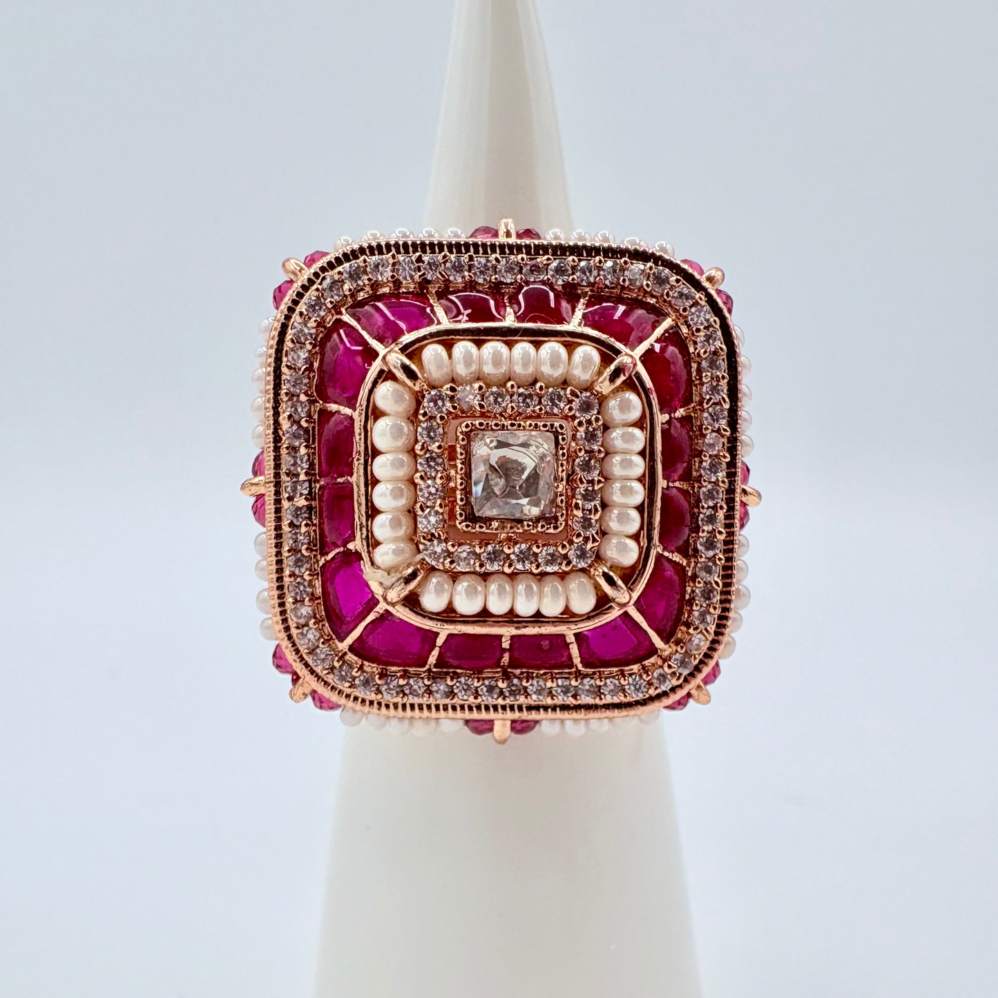 Decorative ring with pink and white stones available at Nishaani.ca – Indian jewelry in Canada