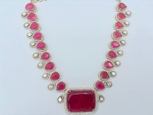 Necklace with pink gemstones and gold accents available at Nishaani.ca – Indian jewelry in Canada