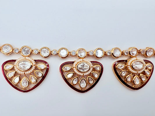Decorative jewelry piece with heart-shaped elements and crystal-like stonesavailable at Nishaani.ca – Indian jewelry in Canada
