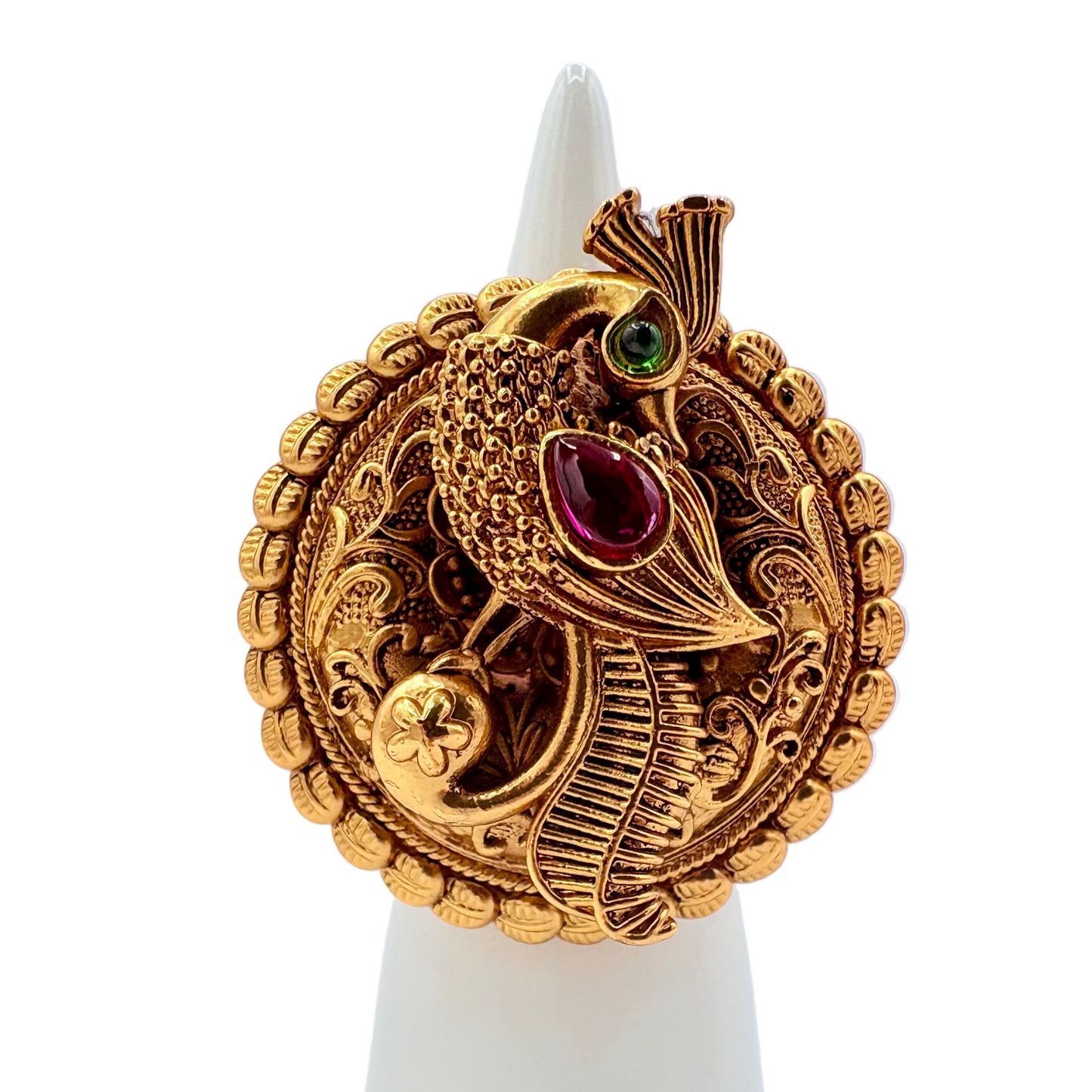 Decorative gold morni (peacock) with green gemstones as eye and red gemstone as a wing available at Nishaani.ca – Indian jewelry in Canada