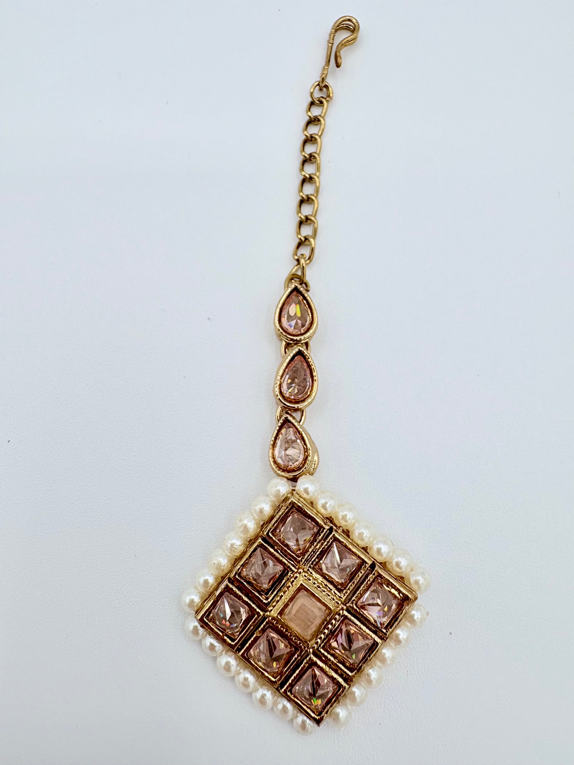 Tikka with gold chain, gemstones, and pearls available at Nishaani.ca – Indian jewelry in Canada