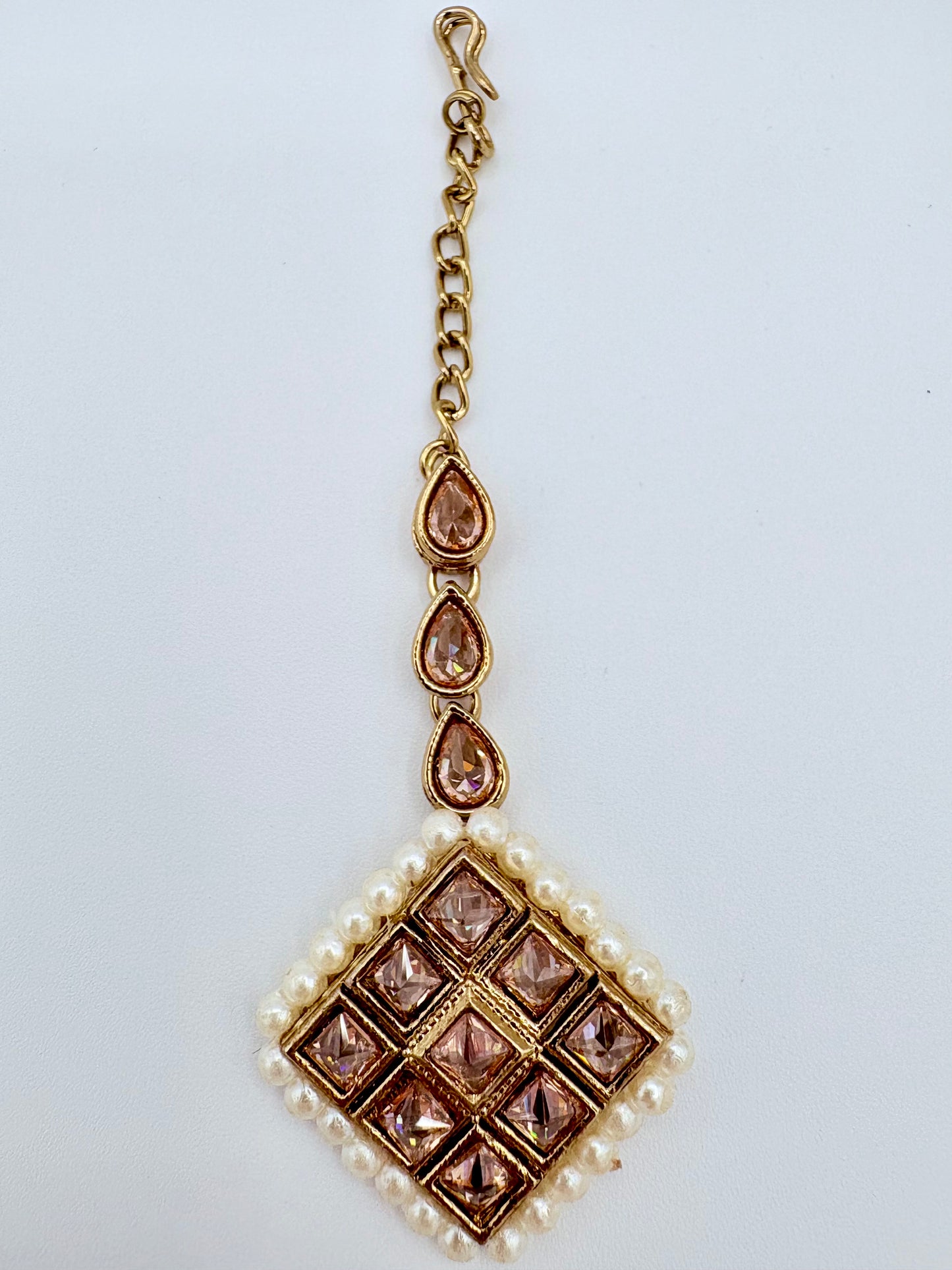 Tikka with gold chain, brown tear drop gemstones, and pearl accents available at Nishaani.ca – Indian jewelry in Canada