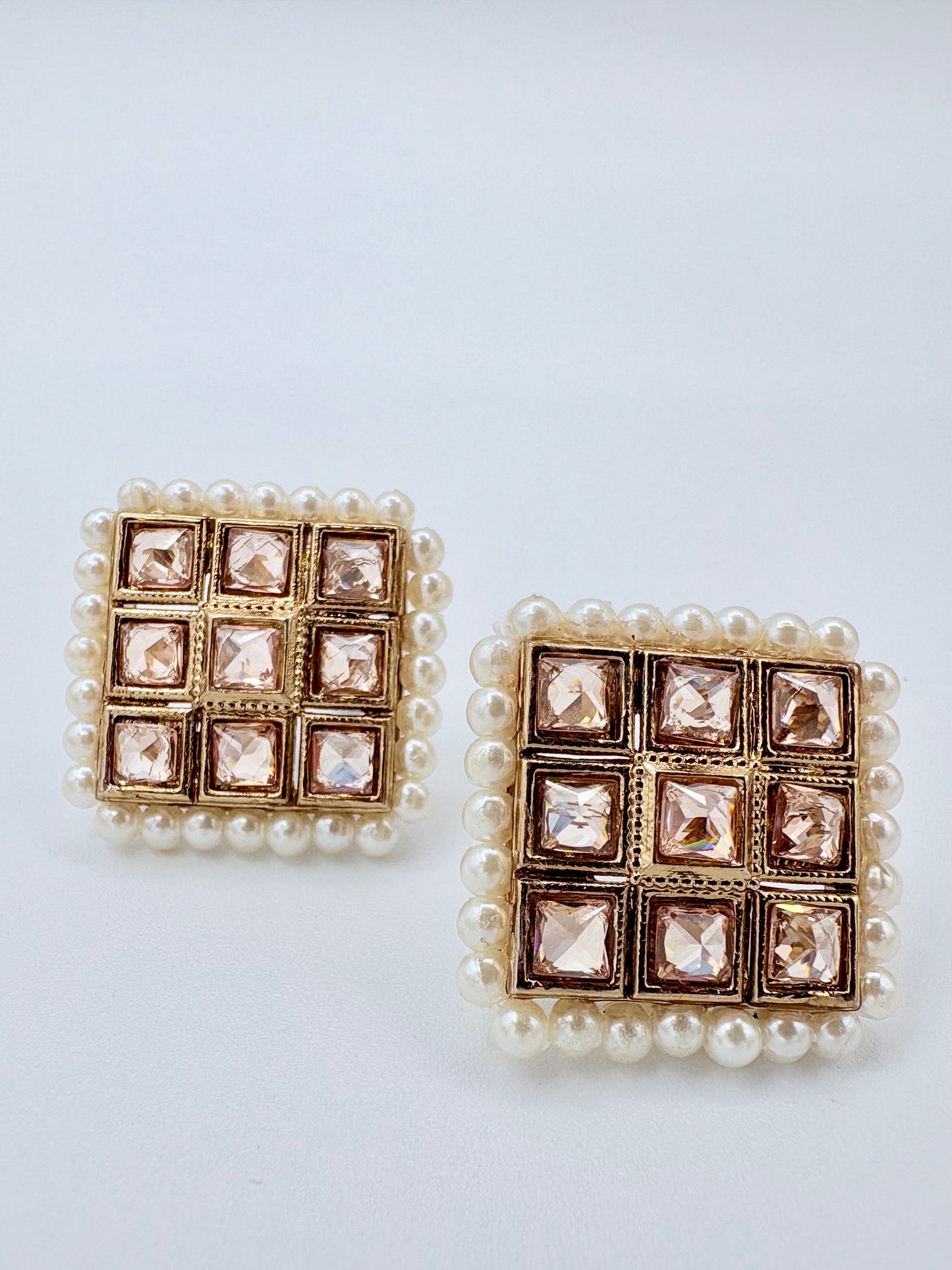 Pair of square-shaped earrings with pearl and gemstone design available at Nishaani.ca – Indian jewelry in Canada