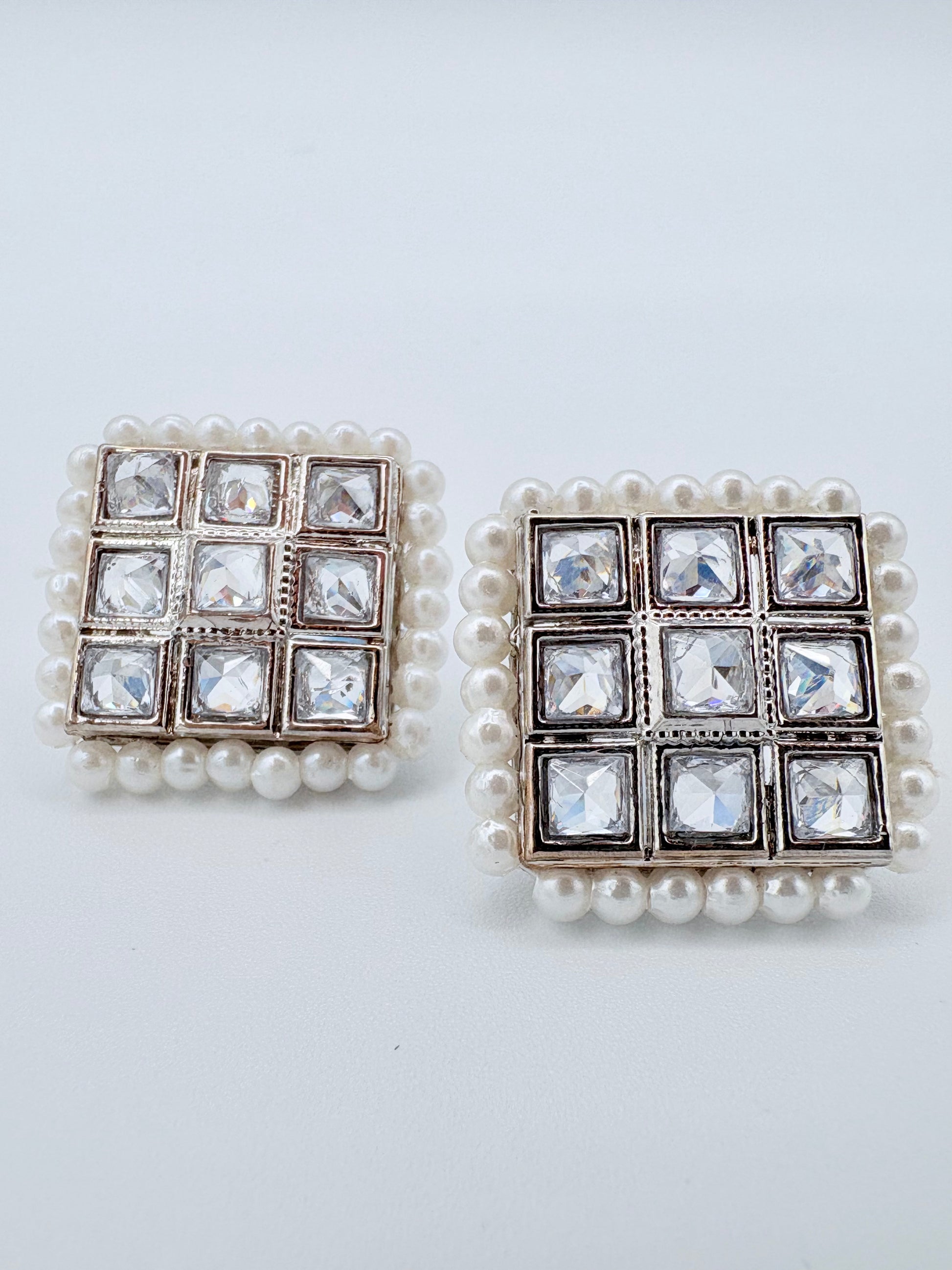 Pair of earrings with square design featuring pearls and crystals available at Nishaani.ca – Indian jewelry in Canada