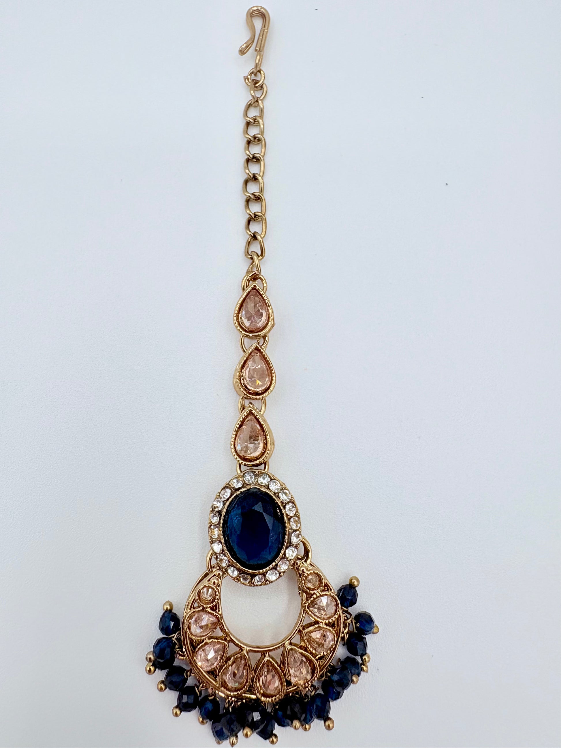 Tikka with blue and gold elements available at Nishaani.ca – Indian jewelry in Canada