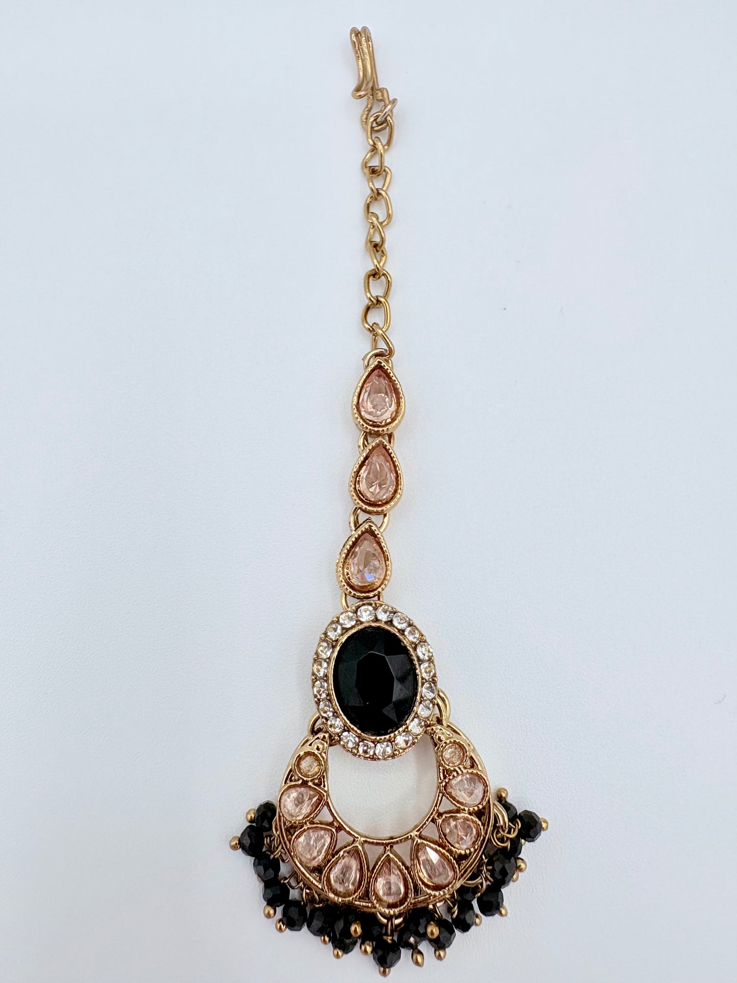 Tikka with gold chain, black and white stones available at Nishaani.ca – Indian jewelry in Canada