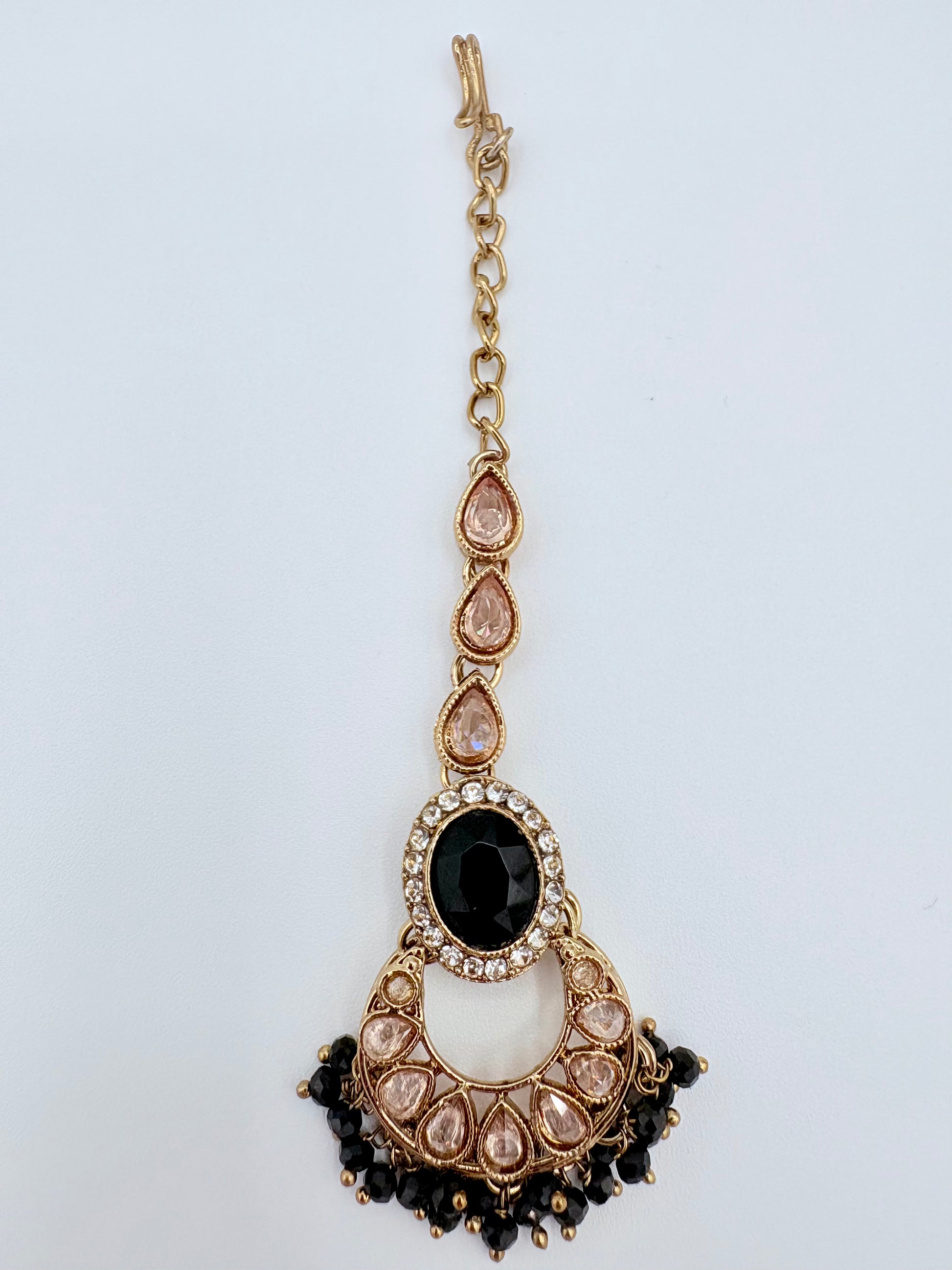 Tikka with gold chain, black and white stones available at Nishaani.ca – Indian jewelry in Canada