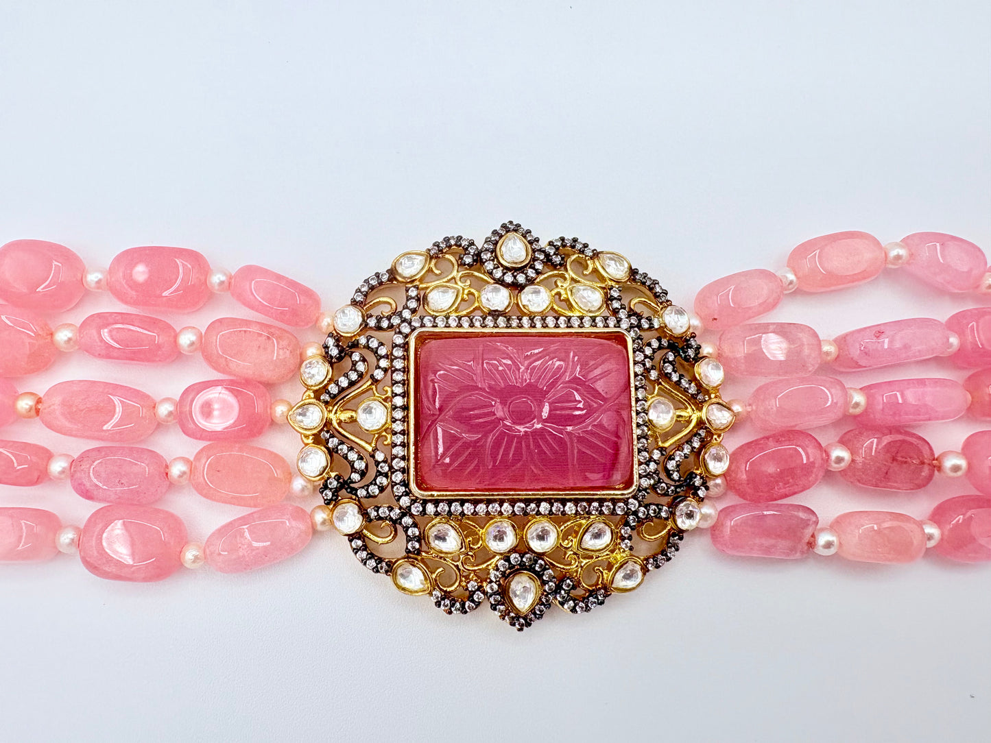 Pink beaded necklace with a decorative pink and gold clasp available at Nishaani.ca – Indian jewelry in Canada