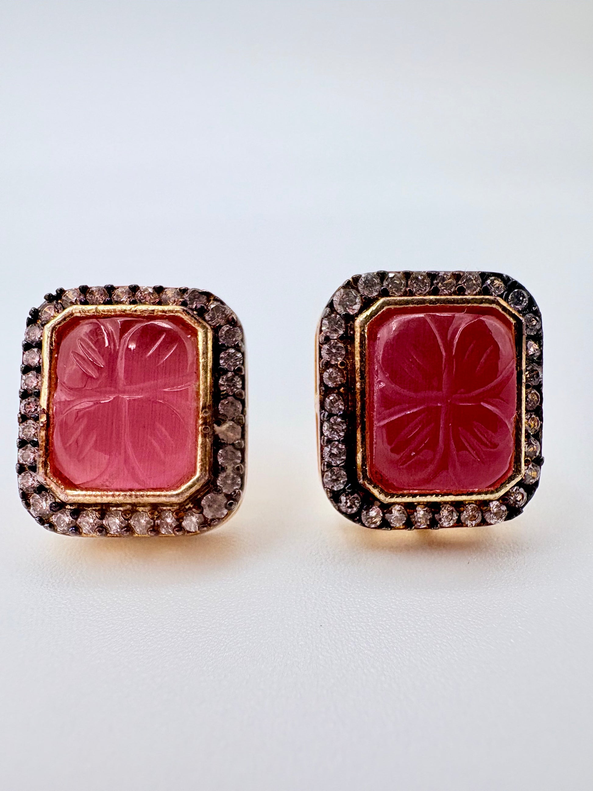 Pair of earrings with pink central stones and gold frames available at Nishaani.ca – Indian jewelry in Canada