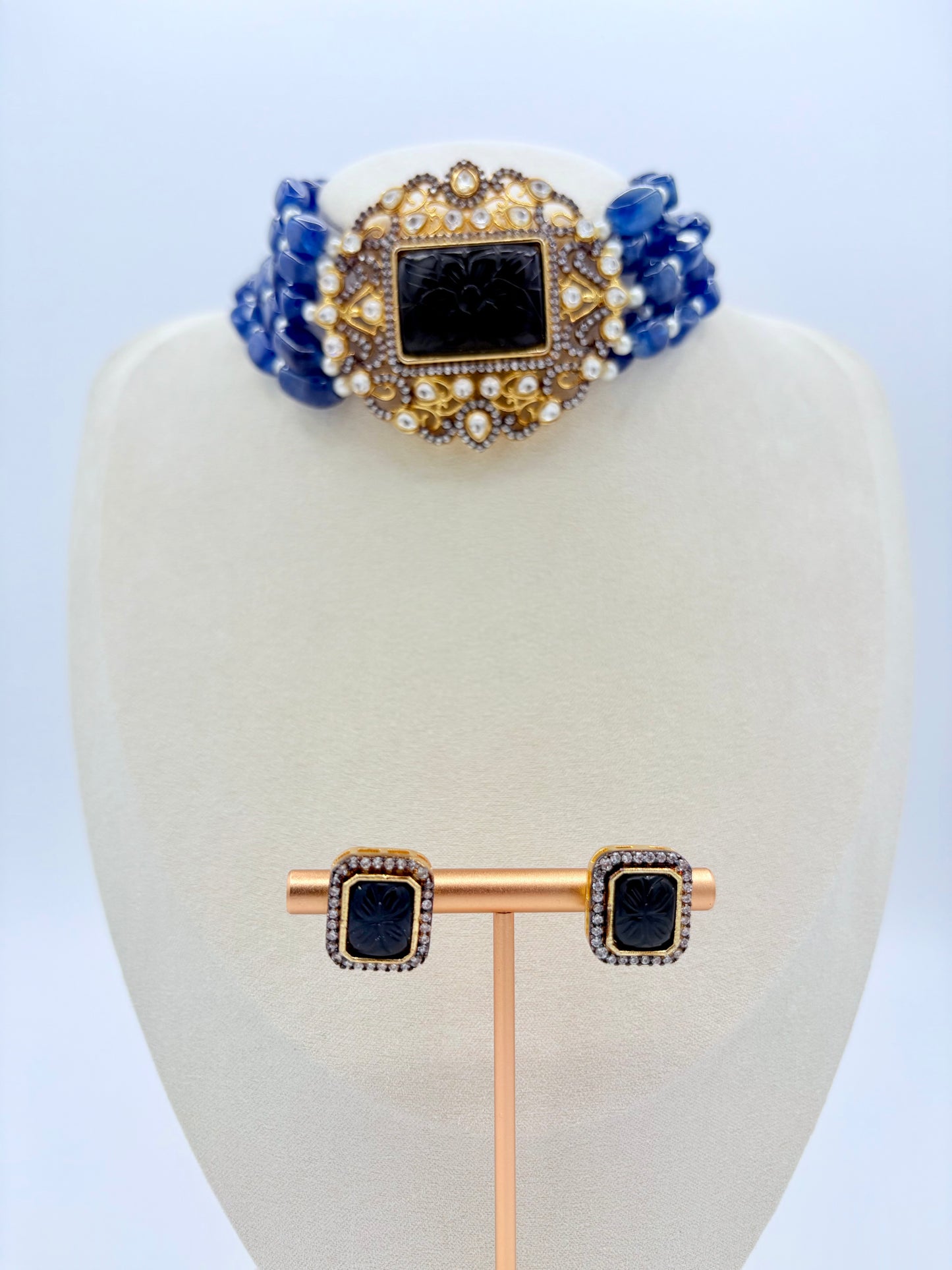 Jewelry set choker necklace and earrings on a mannequin bust available at Nishaani.ca – Indian jewelry in Canada
