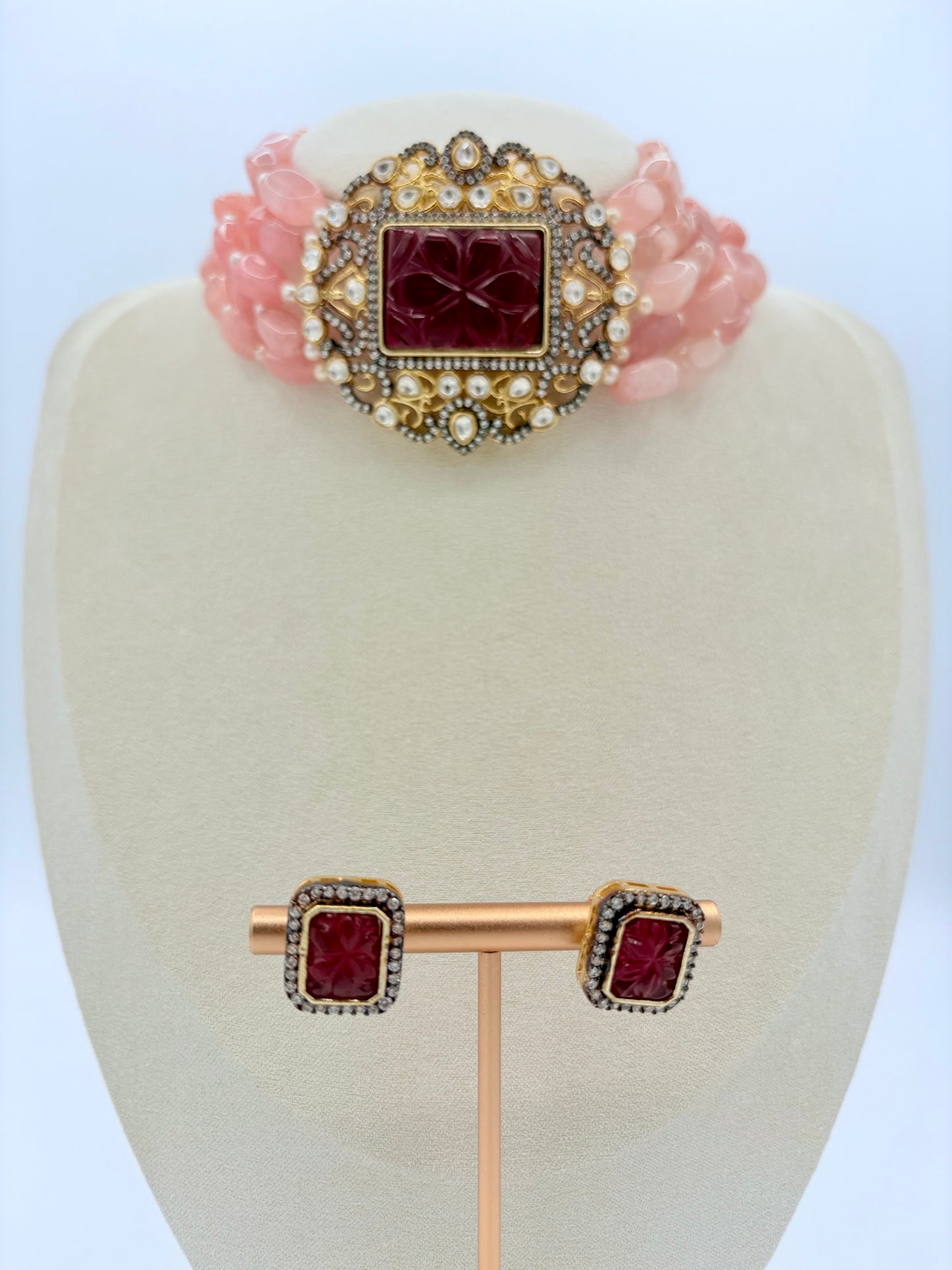 Choker necklace and earrings on a mannequin bust available at Nishaani.ca – Indian jewelry in Canada
