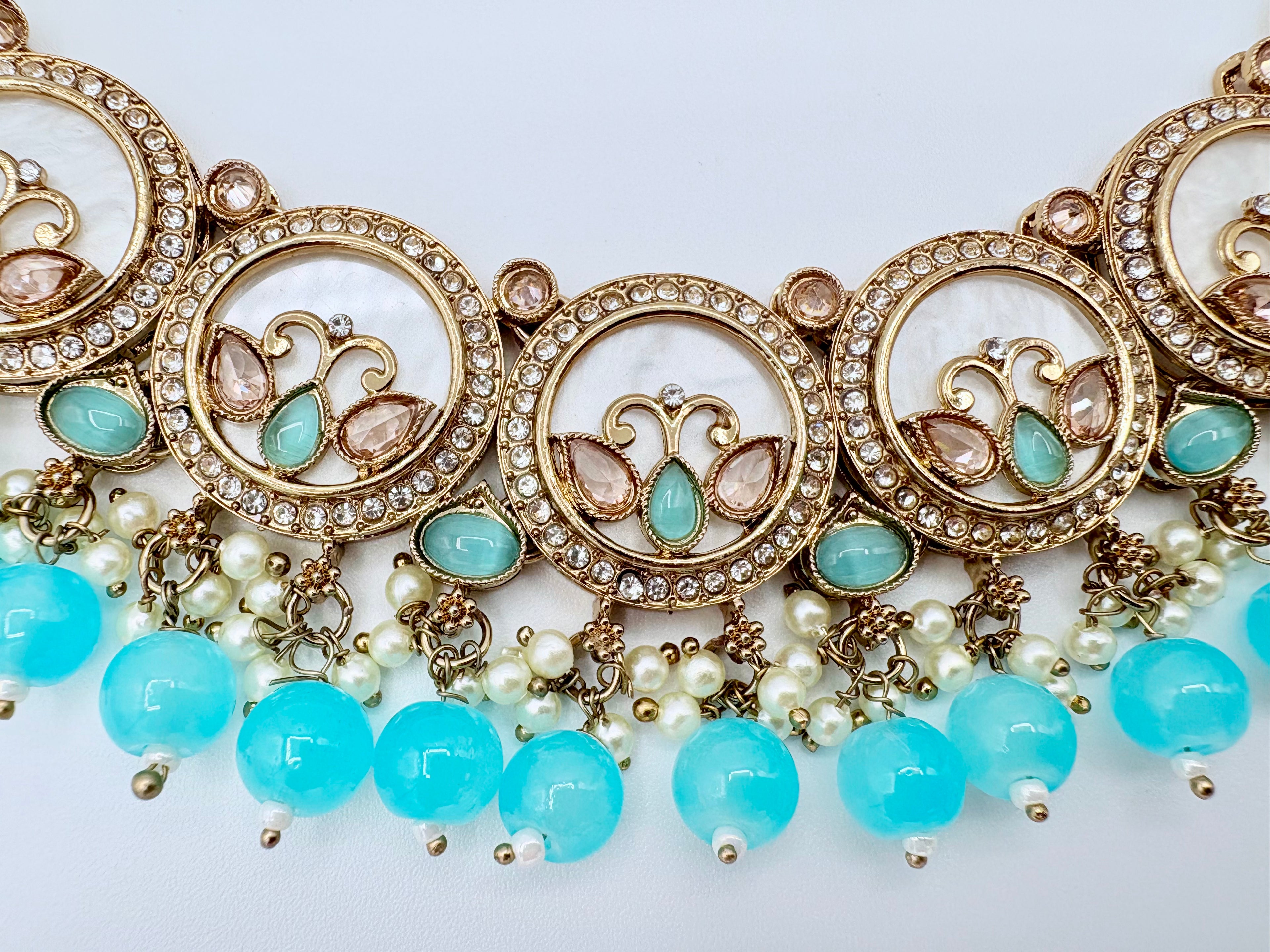 Ornate necklace with turquoise beads and gold accents available at Nishaani.ca – Indian jewelry in Canada