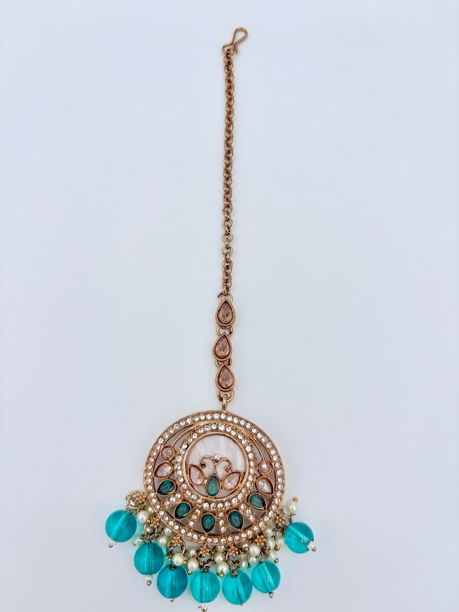 Tikka with turquoise beads and gold chain available at Nishaani.ca – Indian jewelry in Canada