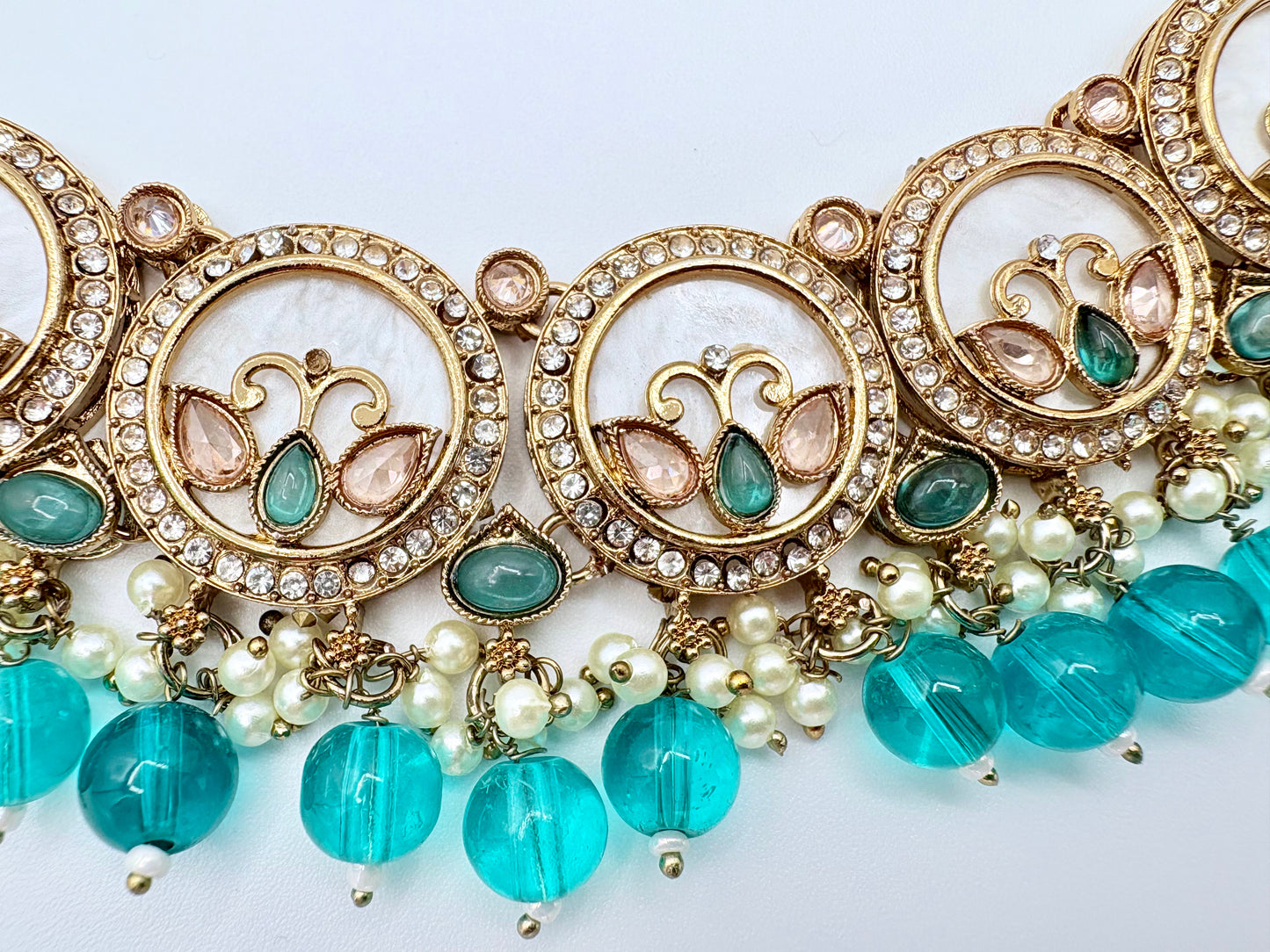 Decorative jewelry with turquoise beads and gold accents available at Nishaani.ca – Indian jewelry in Canada