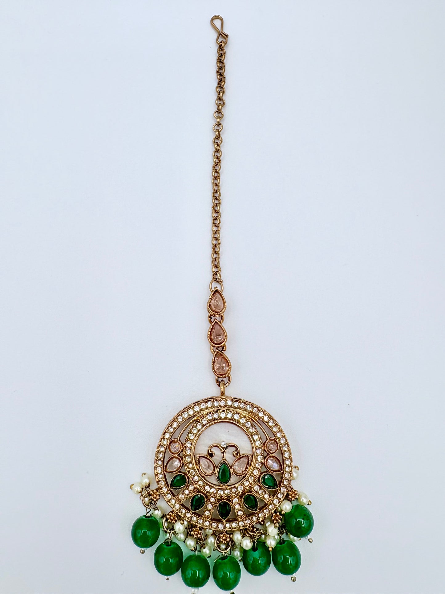 Decorative pendantTikka and gold chain available at Nishaani.ca – Indian jewelry in Canada