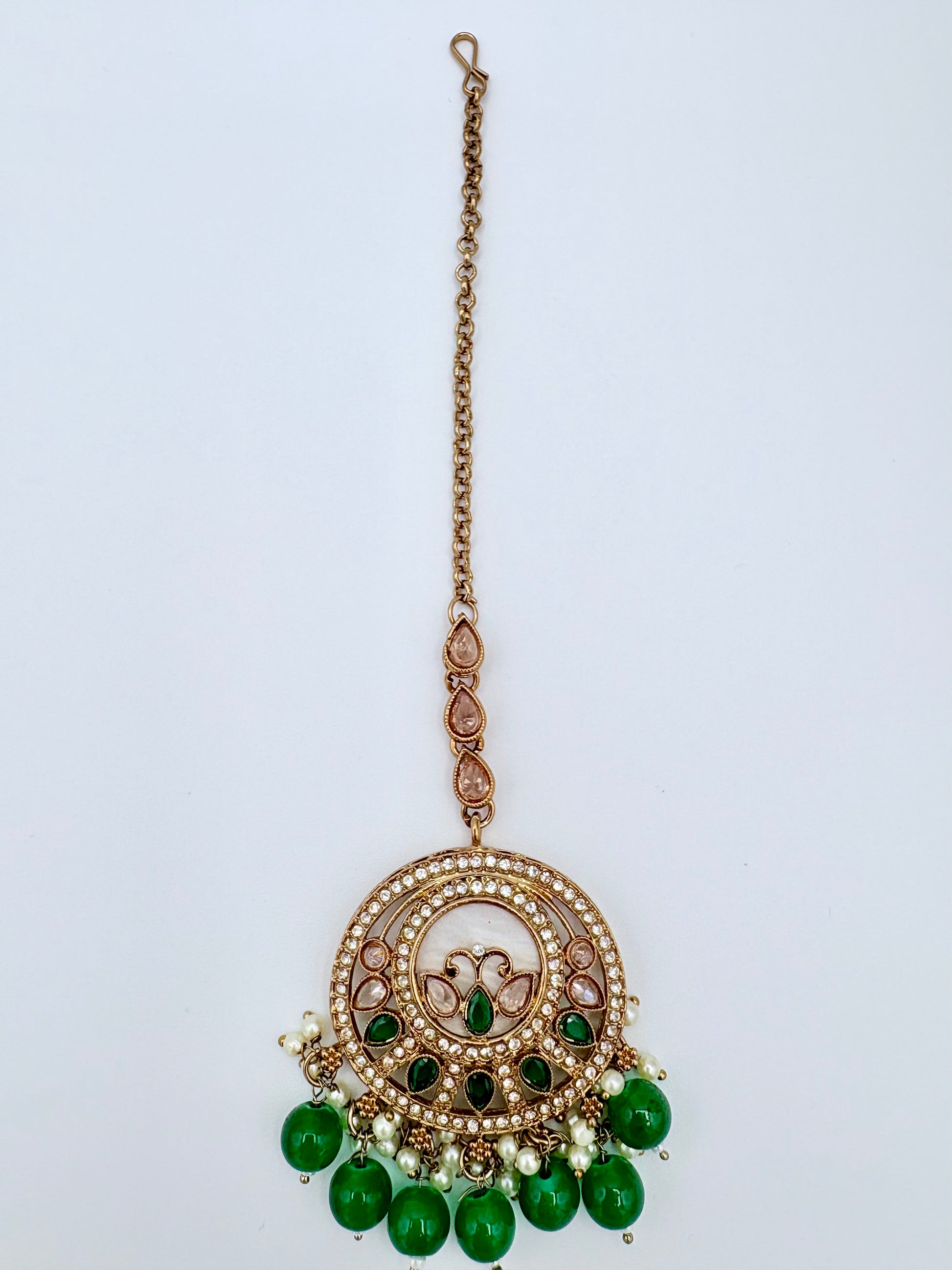 Decorative pendantTikka and gold chain available at Nishaani.ca – Indian jewelry in Canada