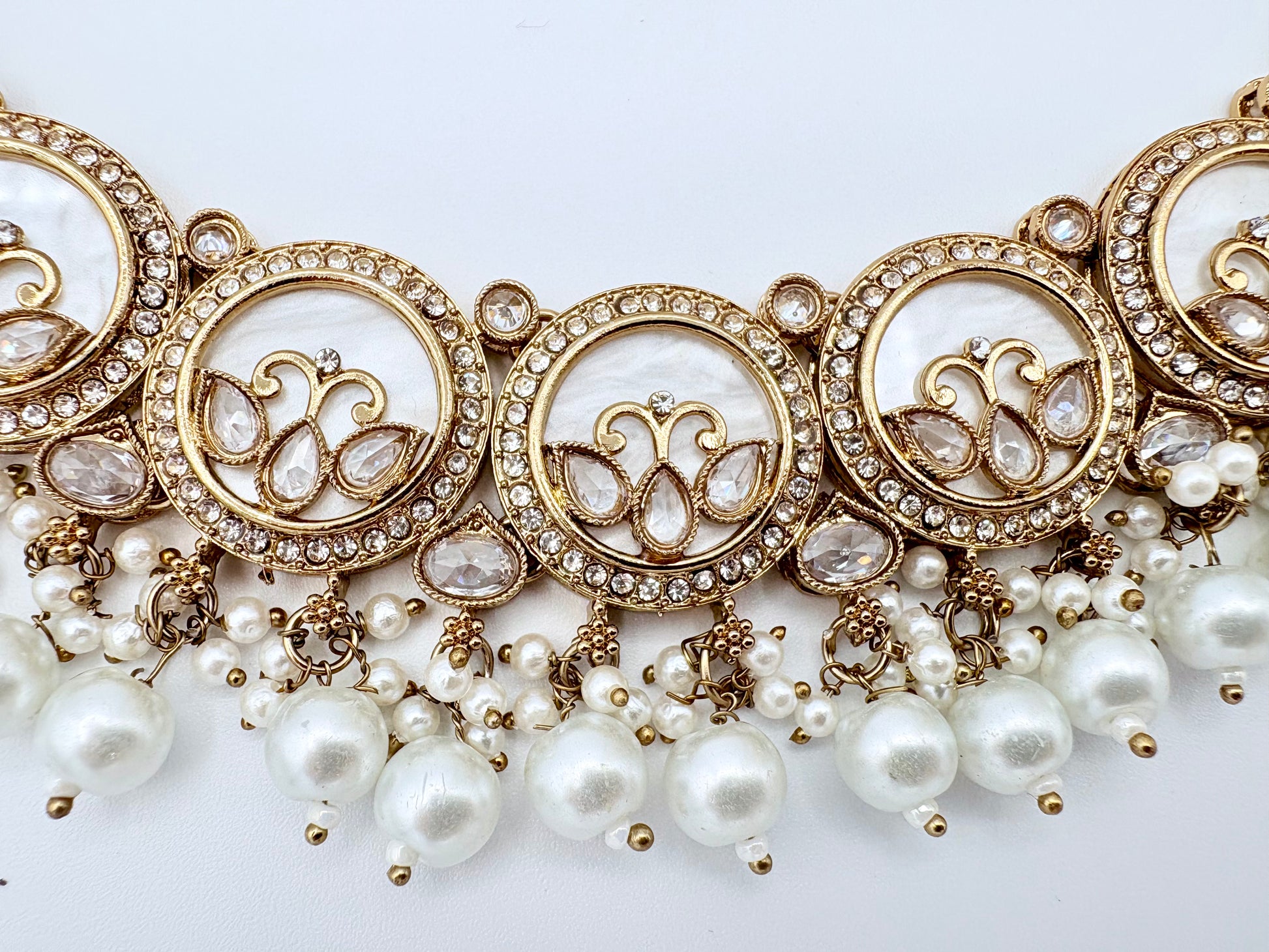 Ornate gold and pearl jewelry available at Nishaani.ca – Indian jewelry in Canada