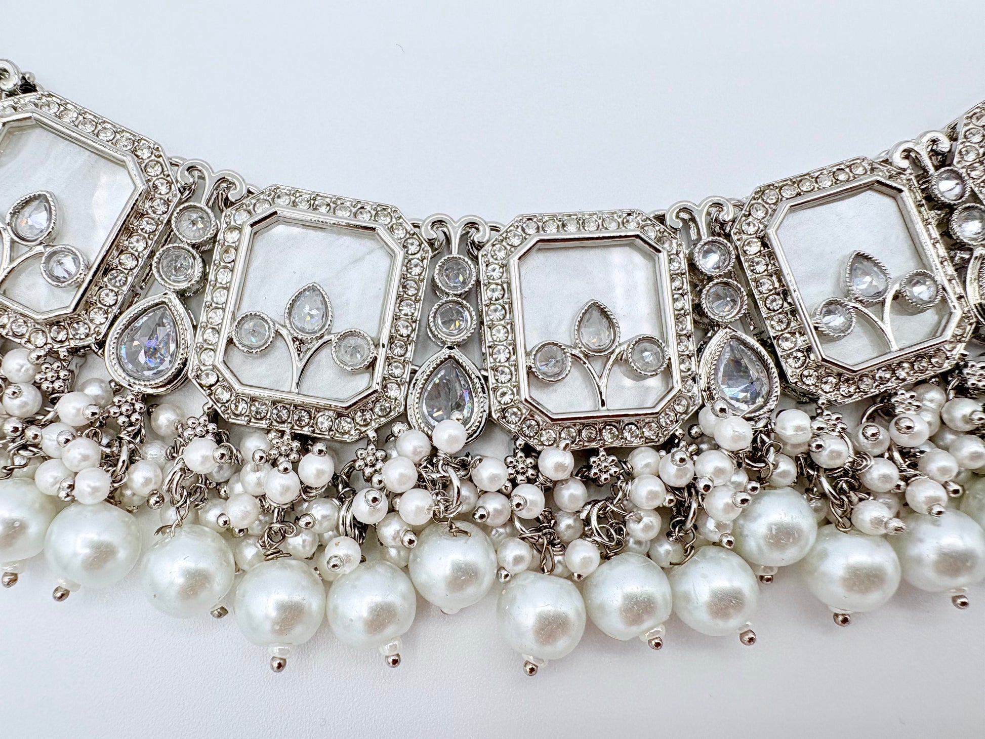 Elegant necklace with pearls and decorative elements available at Nishaani.ca – Indian jewelry in Canada