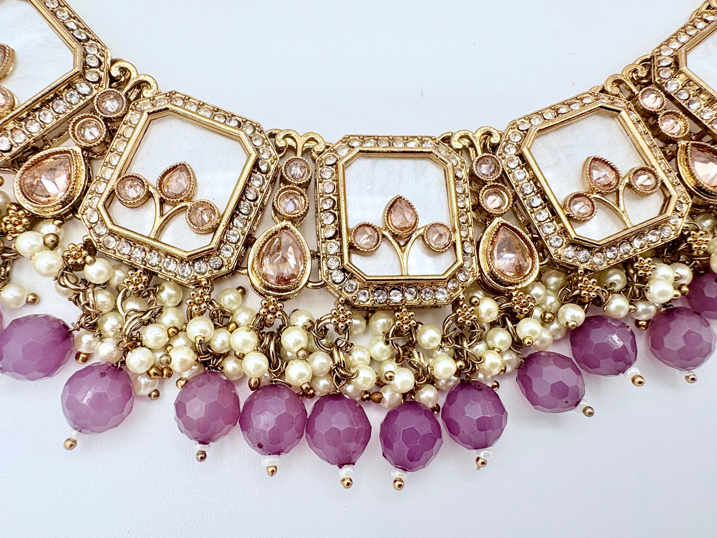 Ornate gold necklace with purple and white beads available at Nishaani.ca – Indian jewelry in Canada