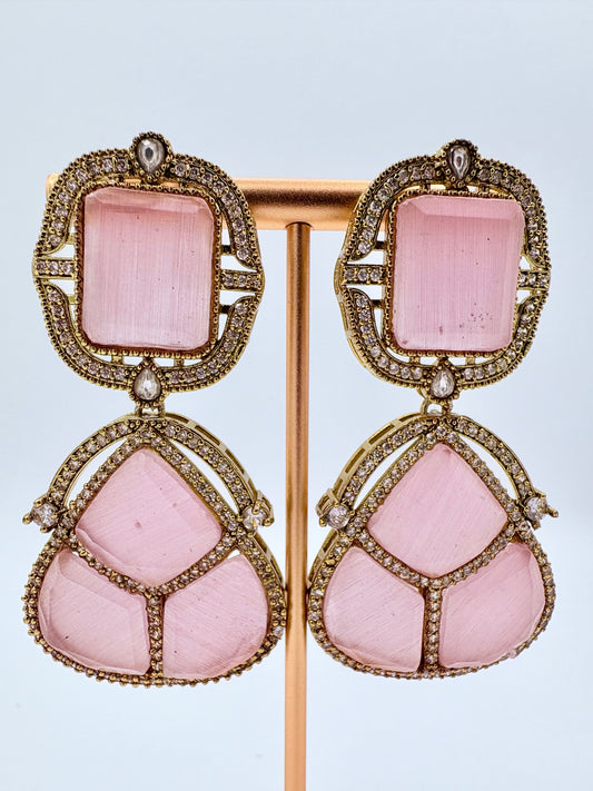 Pair of pink earrings with gold accents available at Nishaani.ca – Indian jewelry in Canada