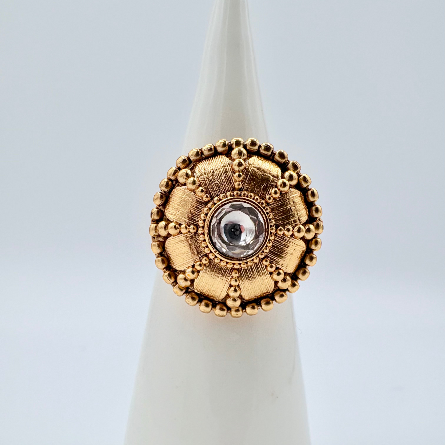 Gold ring with intricate design available at Nishaani.ca – Indian jewelry in Canada