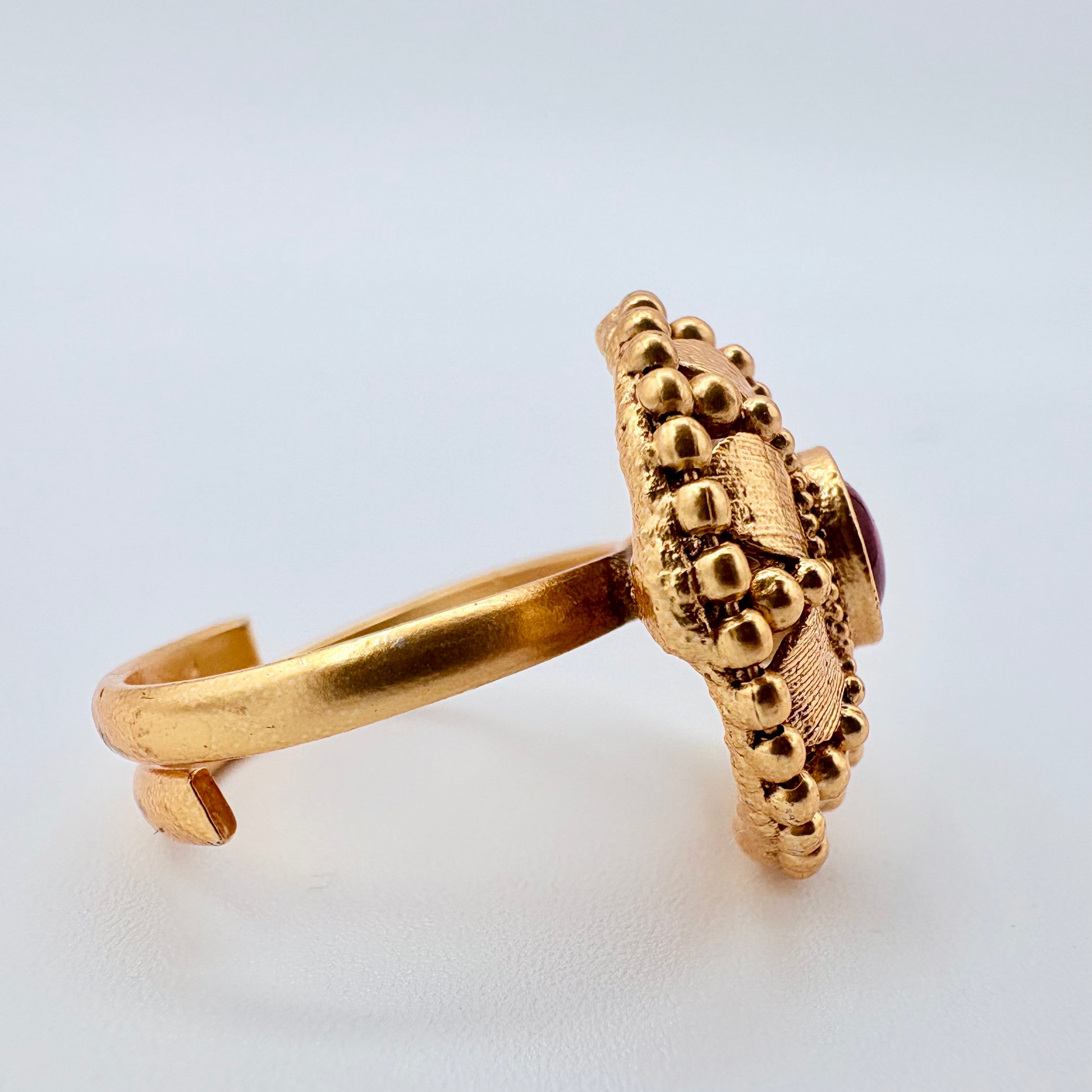 Gold ring with intricate design available at Nishaani.ca – Indian jewelry in Canada