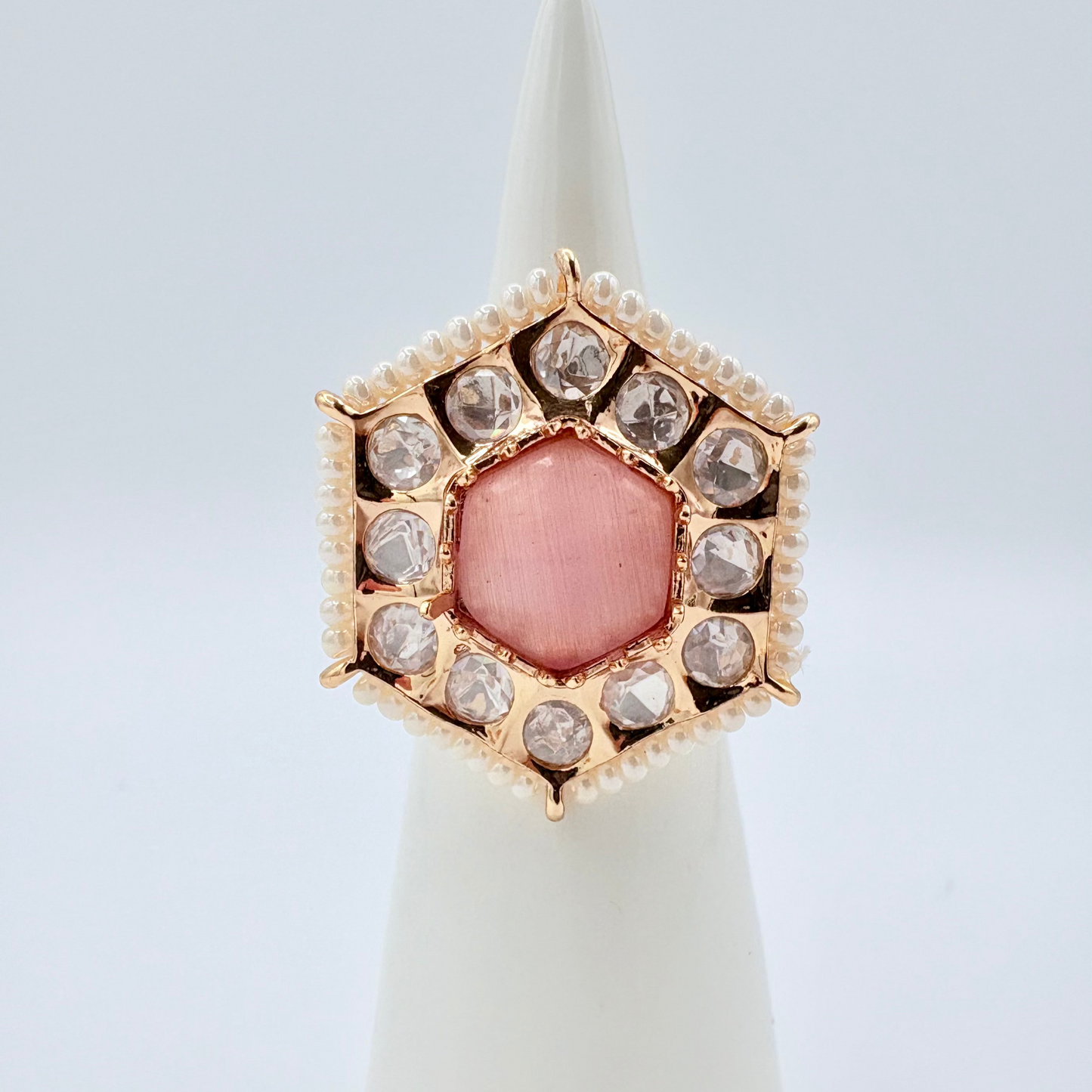 Ring with pink stone and rose gold accents available at Nishaani.ca – Indian jewelry in Canada