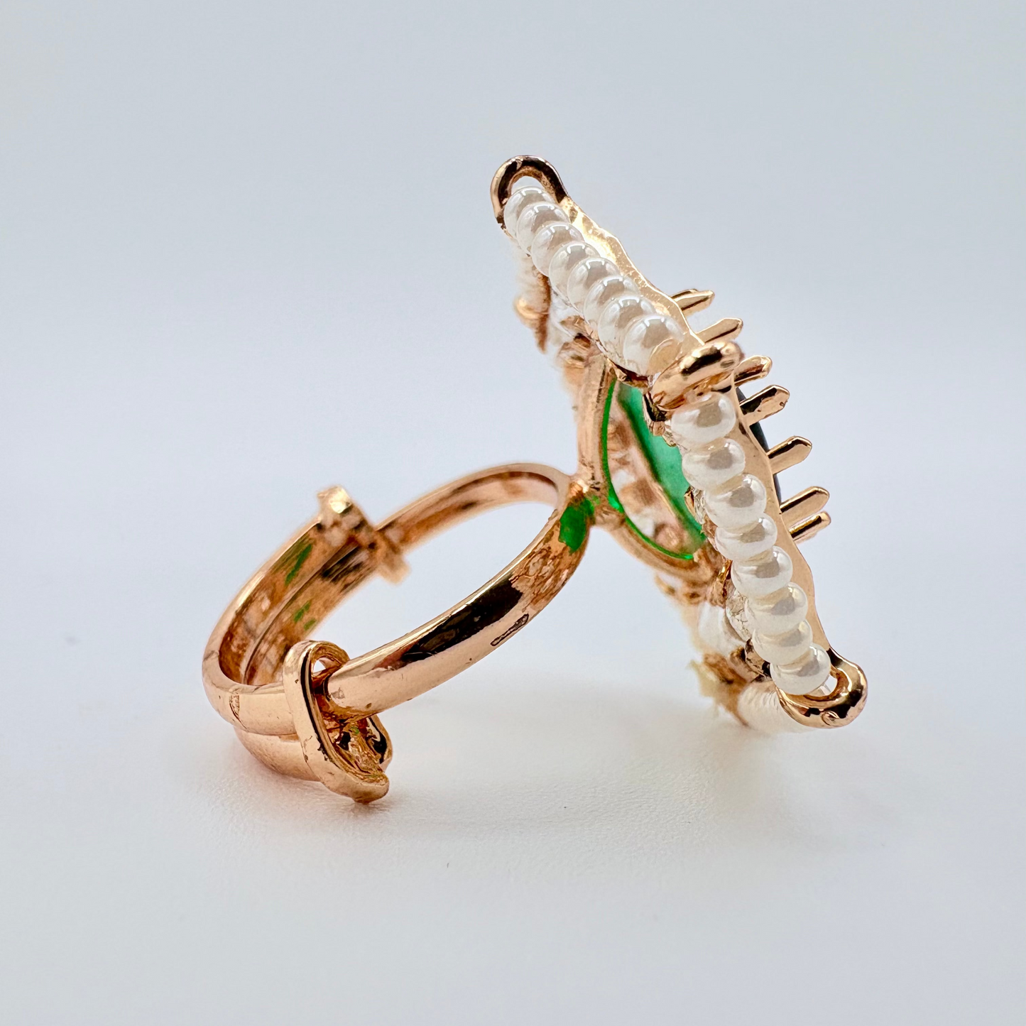 Gold ring with green accents available at Nishaani.ca – Indian jewelry in Canada