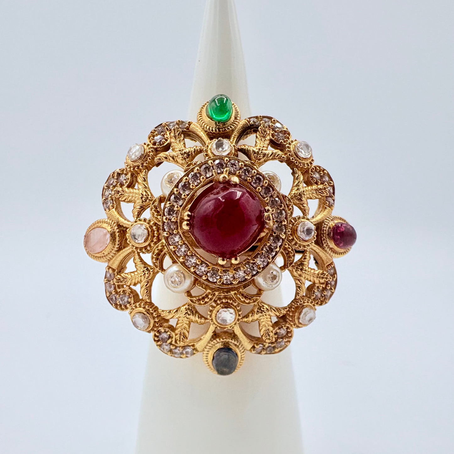 Decorative brooch with gemstones available at Nishaani.ca – Indian jewelry in Canada