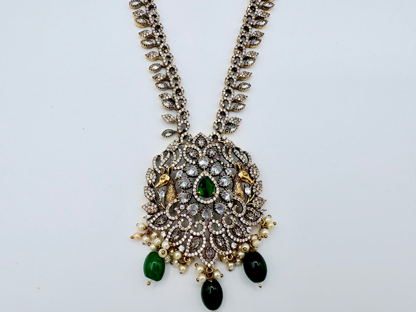 Ornate necklace with green and black stones oavailable at Nishaani.ca – Indian jewelry in Canada