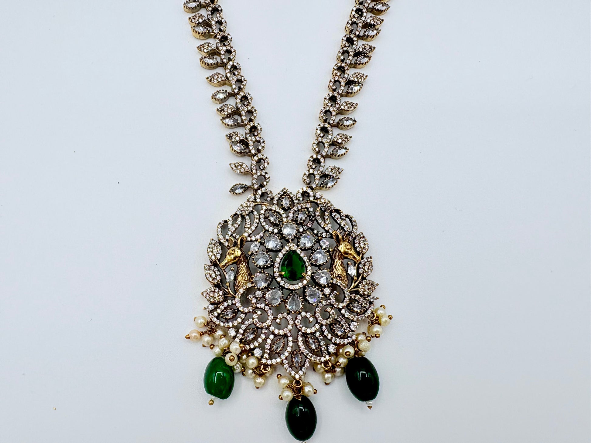 Ornate necklace with green and black stones oavailable at Nishaani.ca – Indian jewelry in Canada