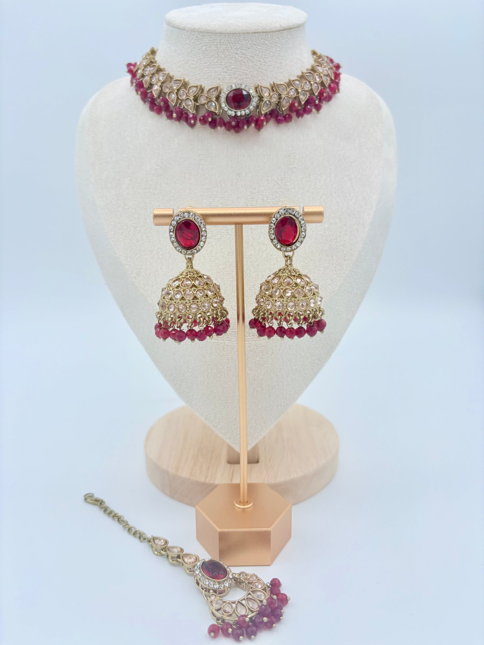 Choker necklace set including necklace, earrings, and anklet on a mannequin bust available at Nishaani.ca – Indian jewelry in Canada